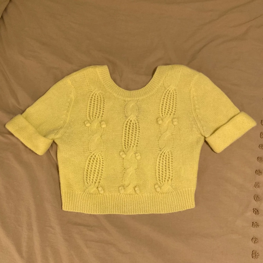 Anthropologie yellow sweater.